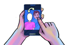 phone-with-face-swapping-app_deciphering-deepfakes_rs_issue_10_deciphering_deepfake_3_web Hands holding a smartphone displaying a face-swapping app. The screen shows a person with a blank, dashed outline for their face, while another face hovers above with an arrow pointing downward, indicating a face swap action.
